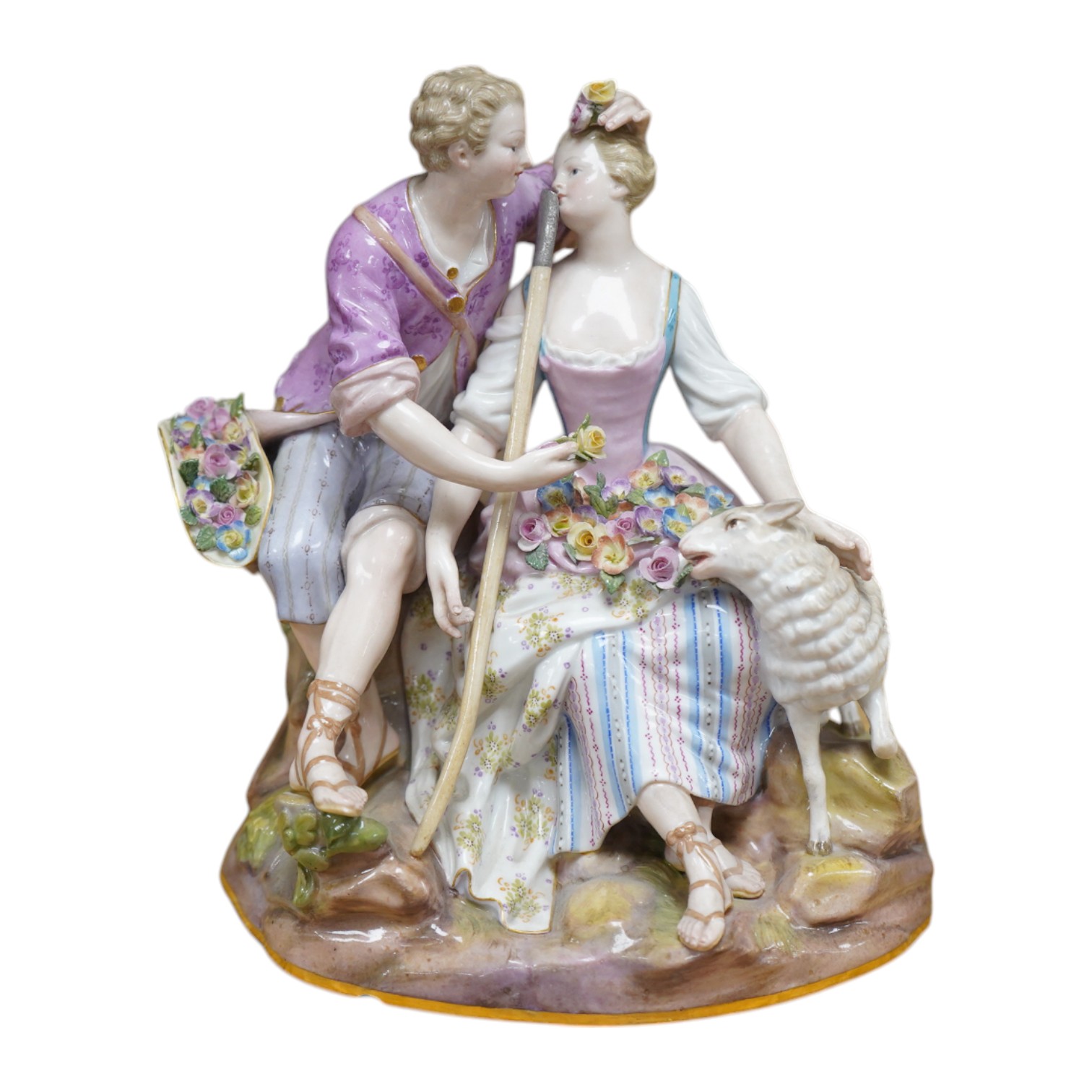 A 19th century Meissen shepherd and shepherdess group, incised to base ‘A41’, 18cm. Condition - fair, chip to base and restoration